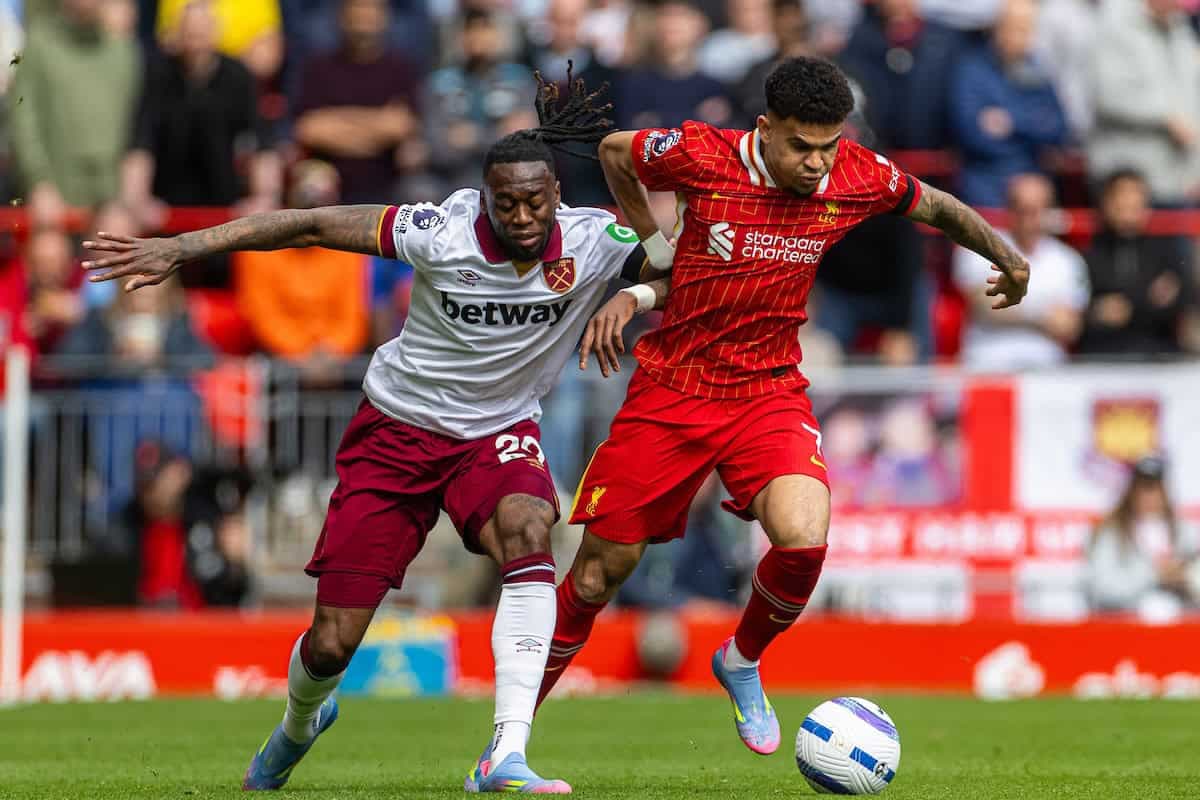 Liverpool and West Ham players competing for the ball