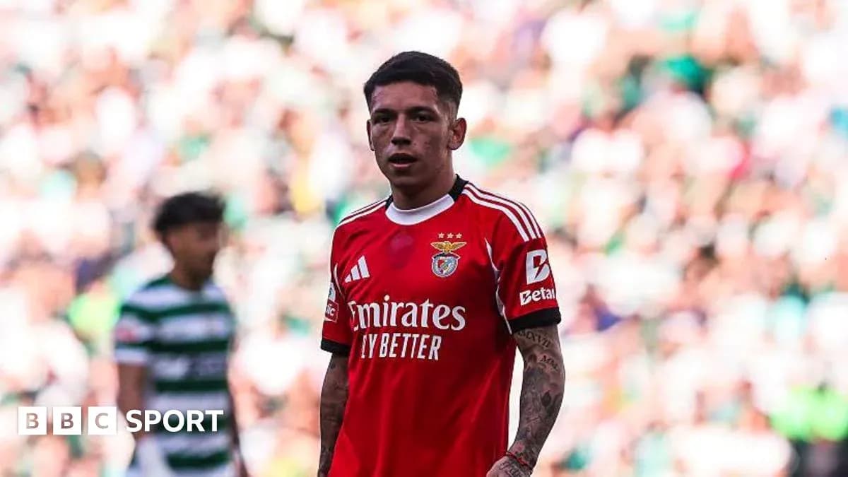 Player wearing Benfica jersey during match on field