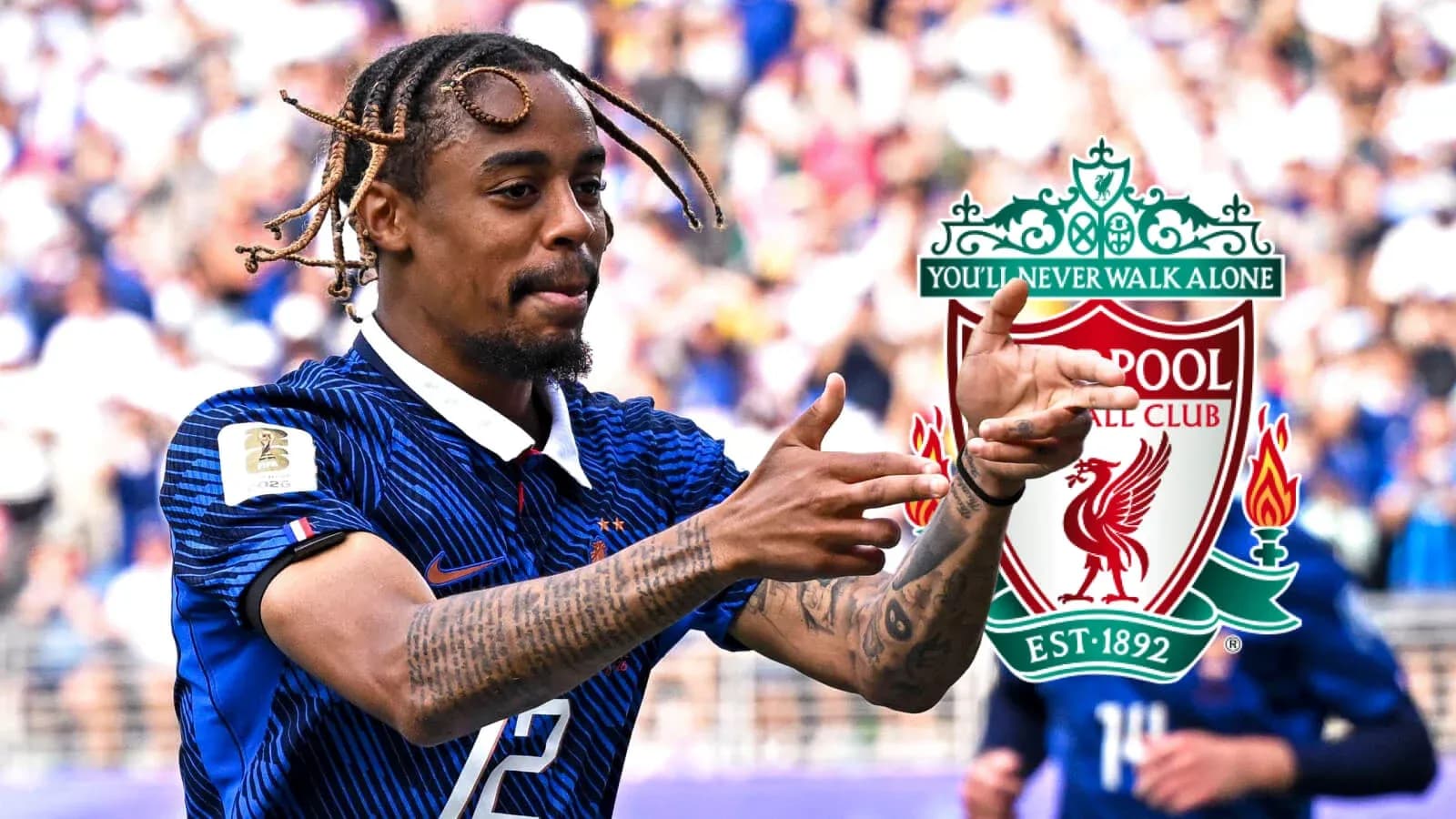 Player gesturing during a match with Liverpool logo