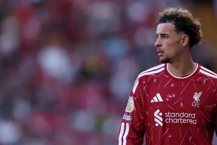 Liverpool player in red kit during match