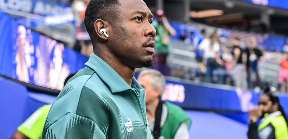 Player walking onto the field before the match
