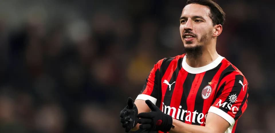 AC Milan player gesturing during a match