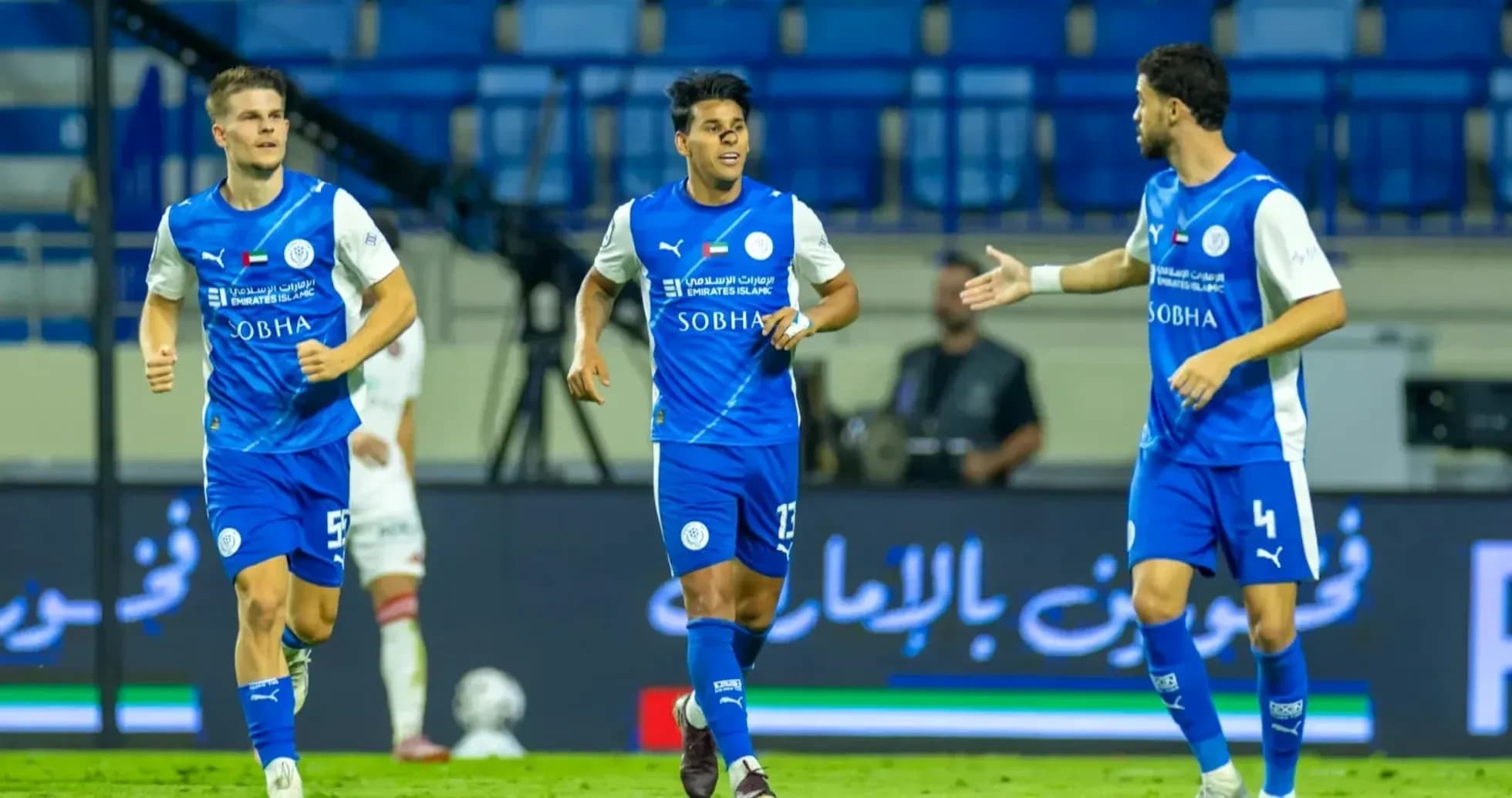 Players celebrating during U23 football match