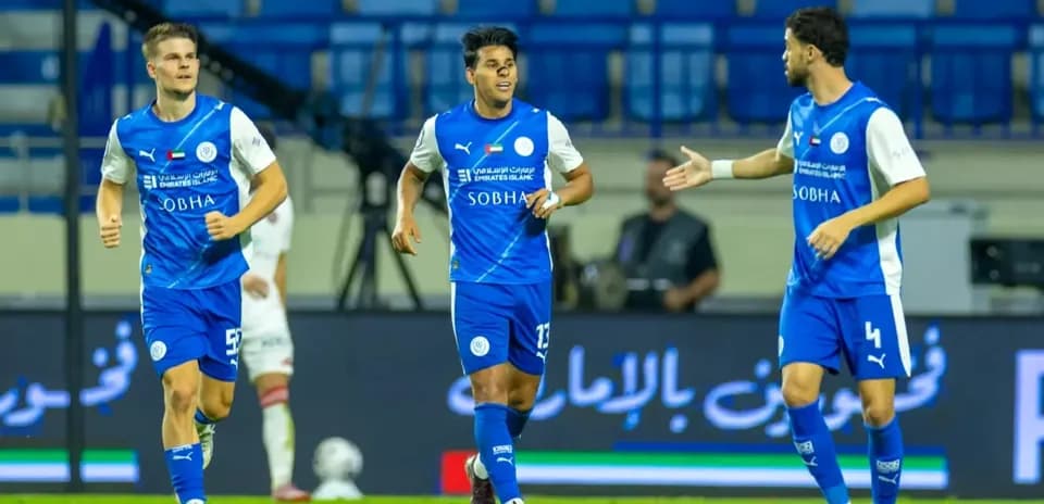 Players celebrating during U23 football match