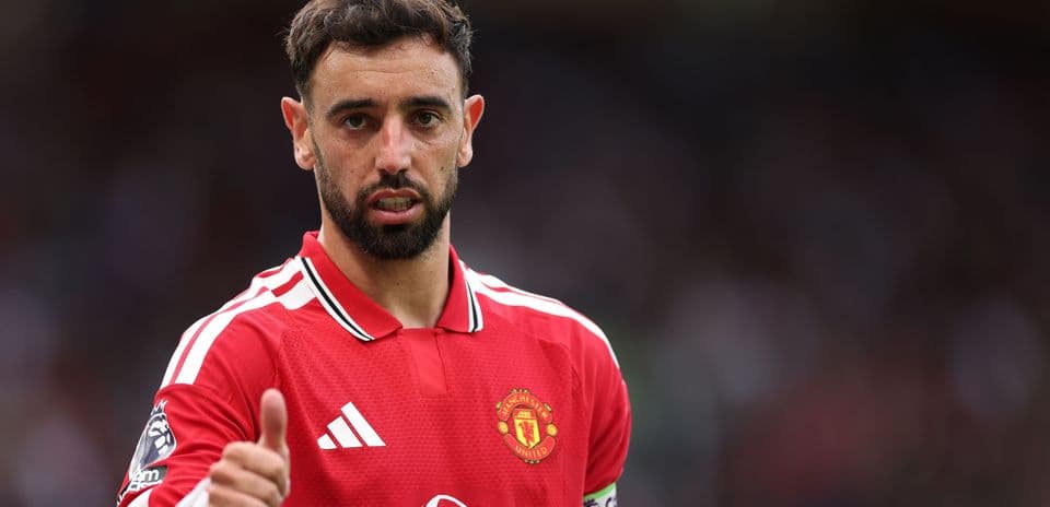 Bruno Fernandes in Manchester United jersey giving thumbs up