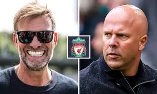 Jurgen Klopp smiling next to opposing coach