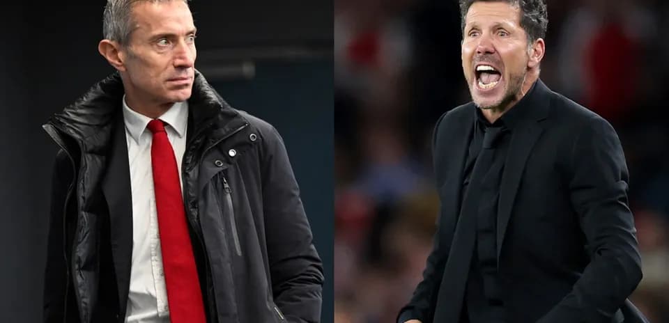 Two football managers on the sidelines during match