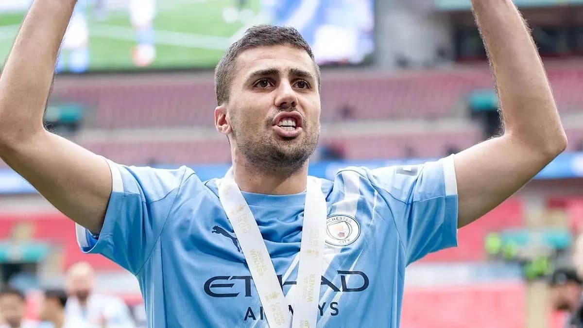 Player celebrating with medal after winning match