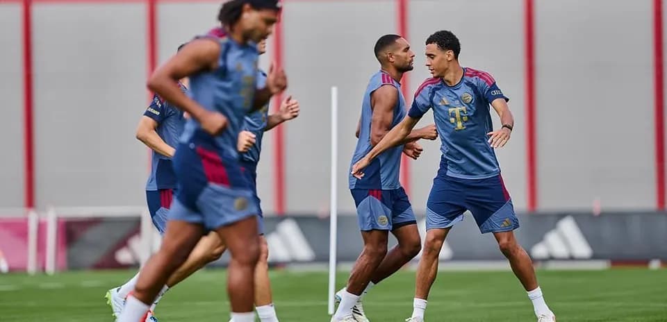 Players training on the pitch during practice session