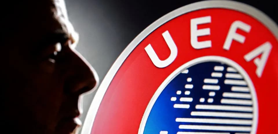 Profile silhouette next to UEFA logo