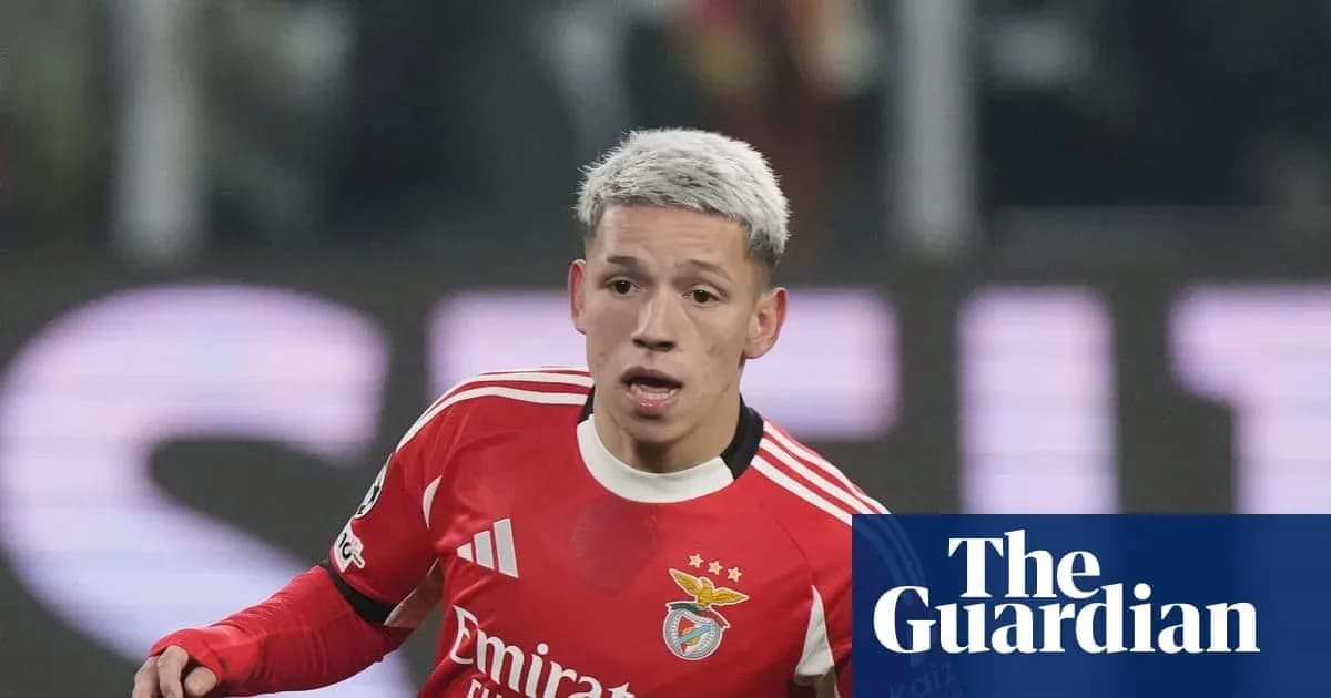 Benfica player in red jersey during match action