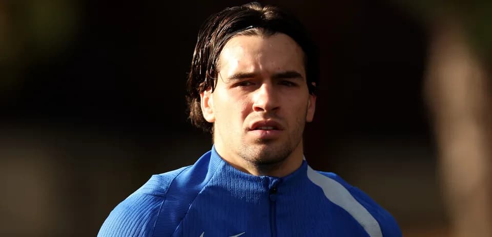 Player in blue training kit during practice session