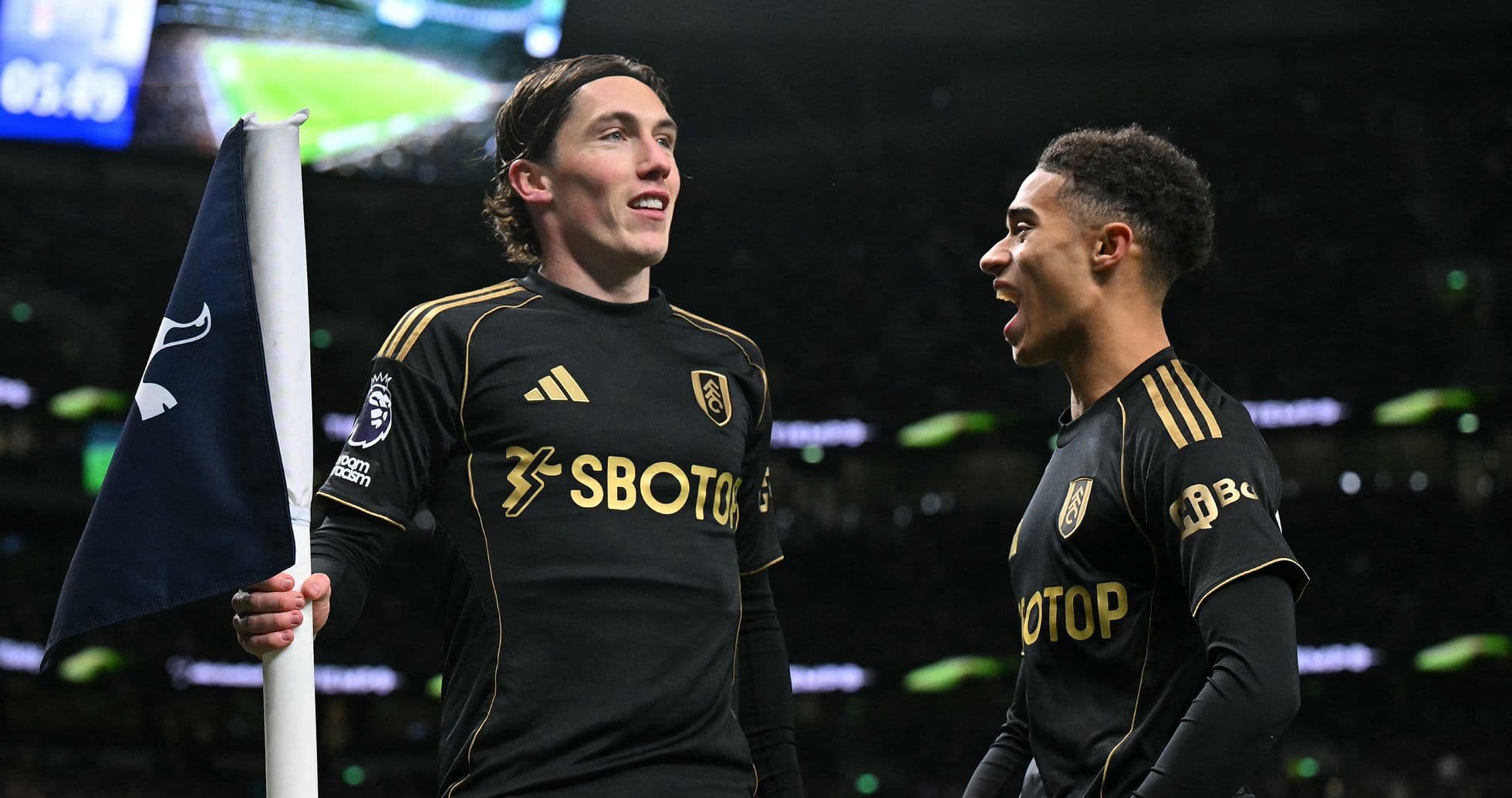 Fulham players celebrating during Premier League match
