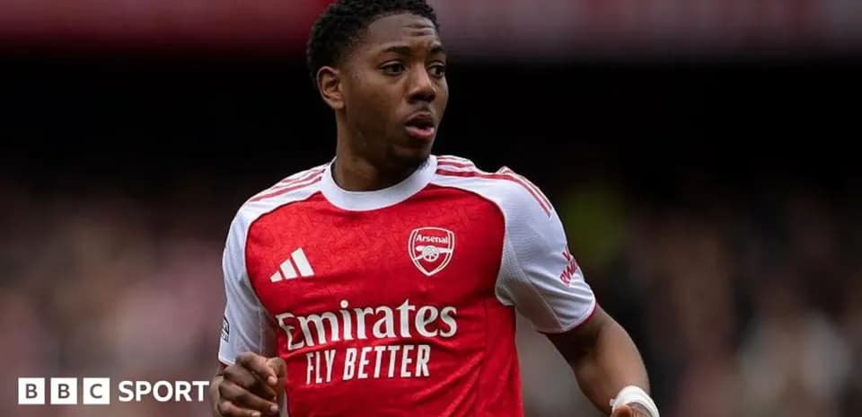 Player wearing Arsenal jersey during a match