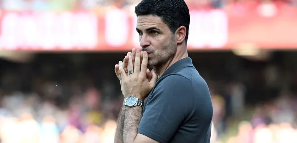 Manager contemplating during a football match
