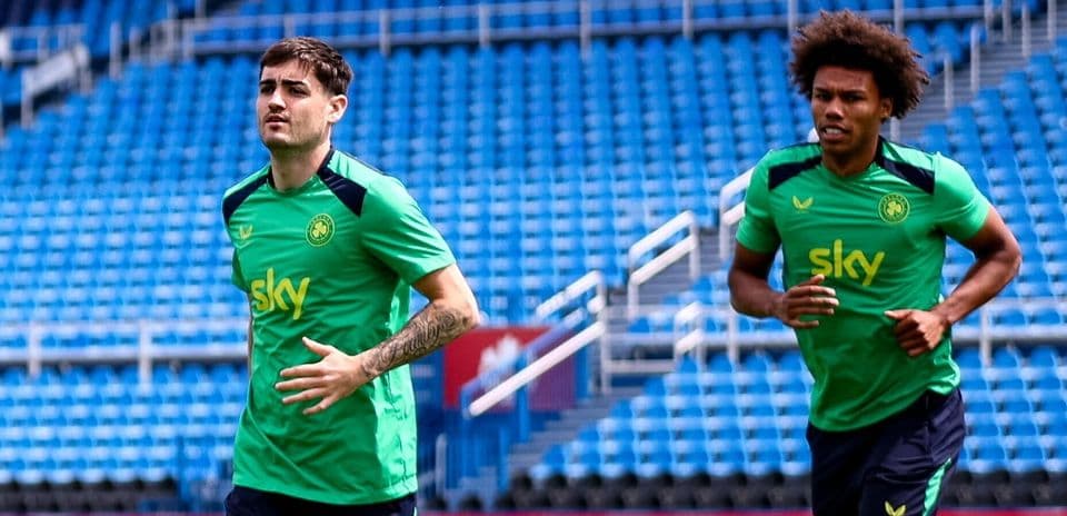 Two players jogging during training session