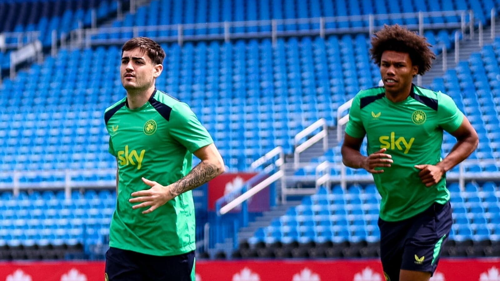 Two players jogging during training session