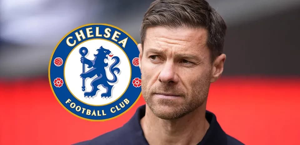 Coach with Chelsea Football Club logo in background