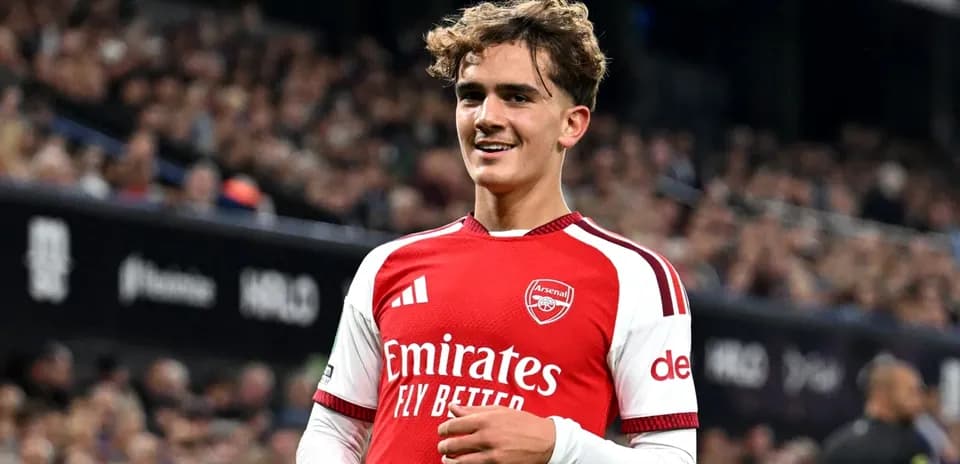Arsenal player smiling during match at stadium