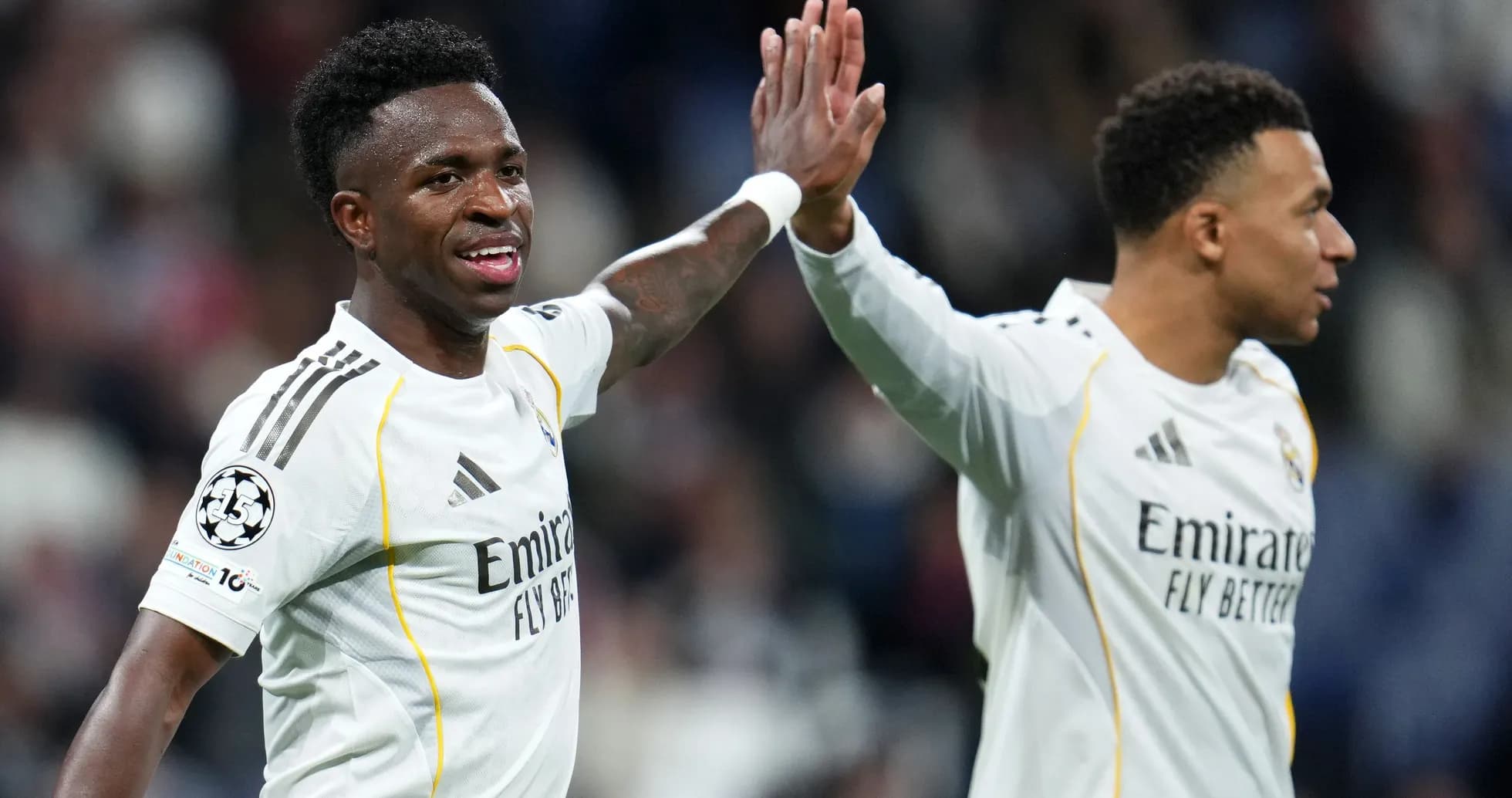 Vinicius Jr. and Mbappe celebrating a goal together
