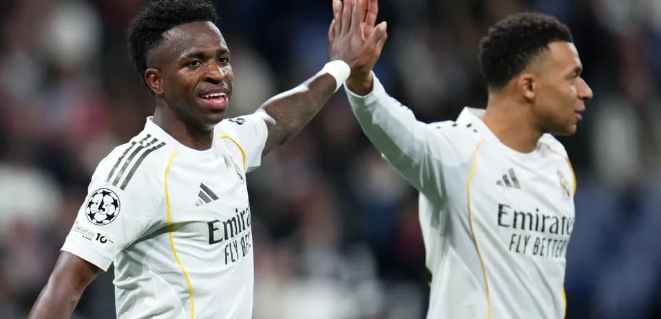 Vinicius Jr. and Mbappe celebrating a goal together