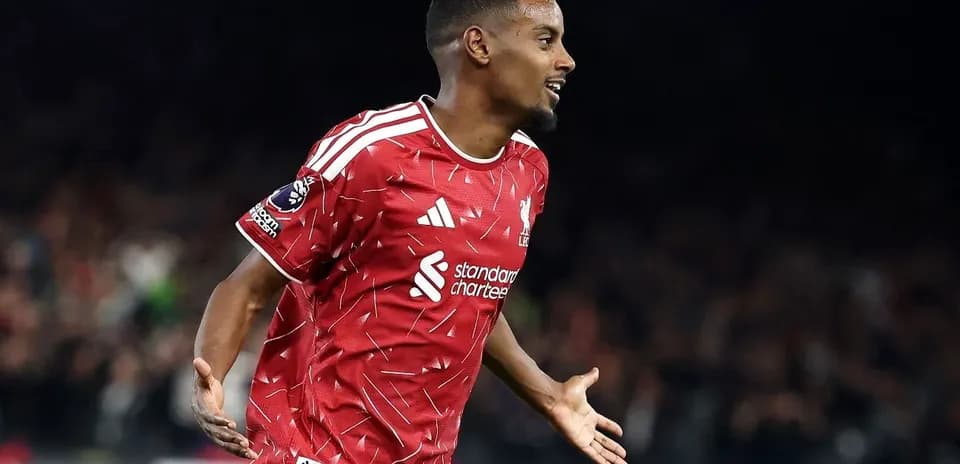 Player celebrating a goal in red jersey