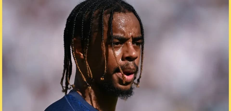 Player with braided hair on the field