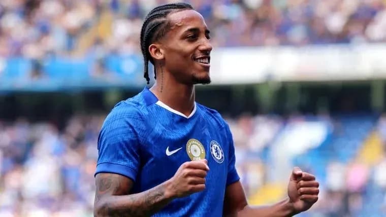 Player celebrating in Chelsea kit during match