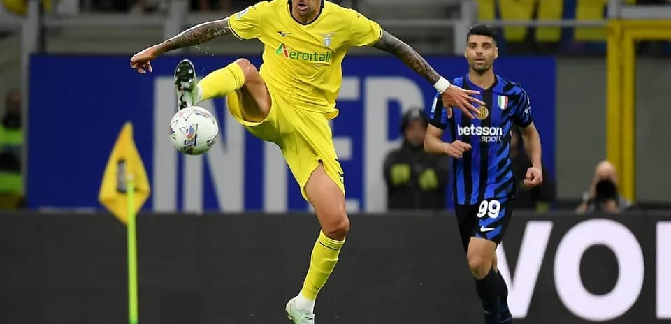 Lazio player controls the ball during match