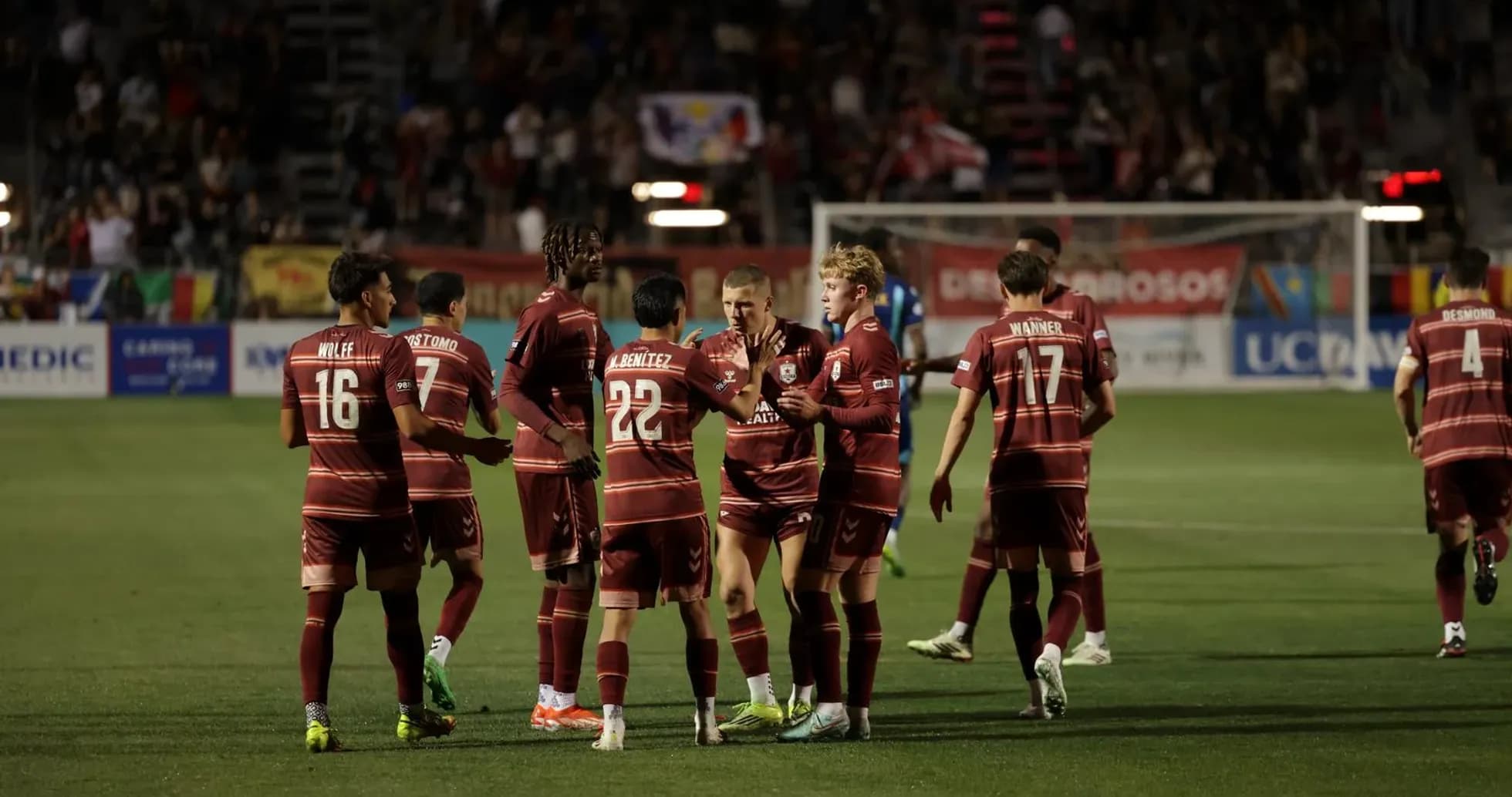 Players celebrating during Colorado Springs match