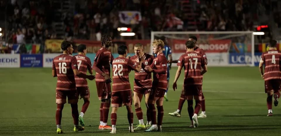 Players celebrating during Colorado Springs match