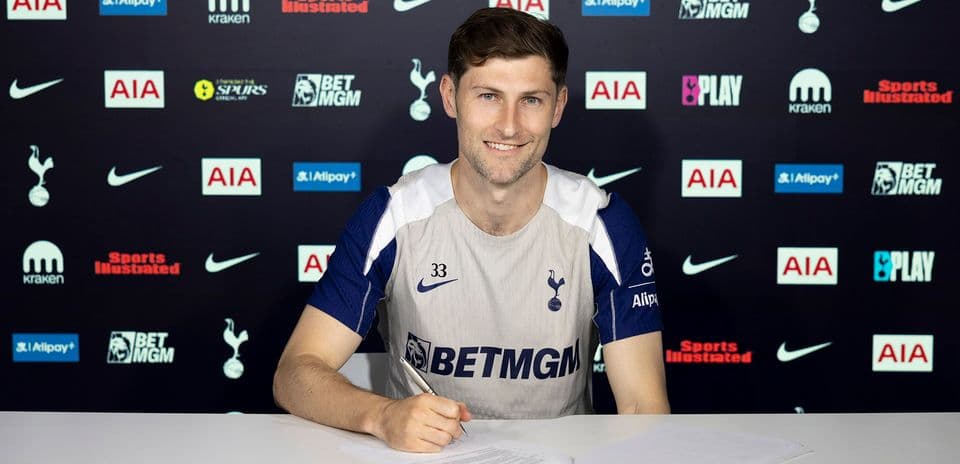 Player signing contract at Tottenham press conference