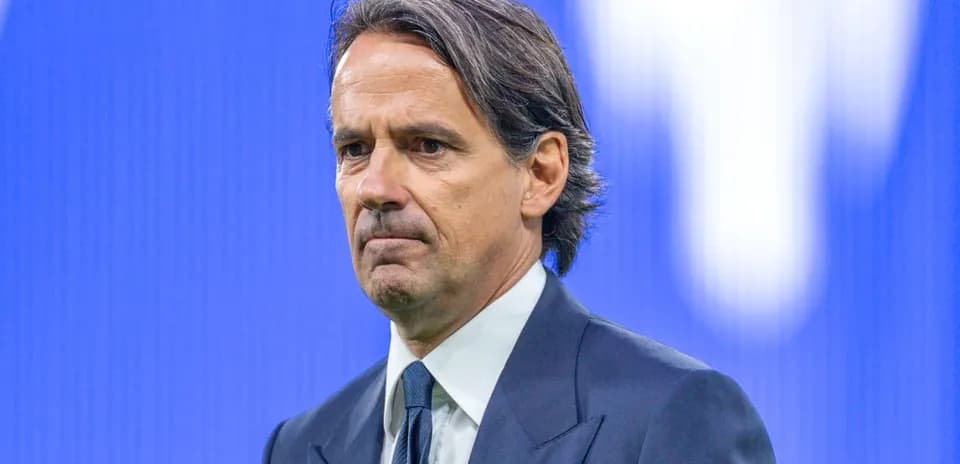 Manager in formal attire during press conference