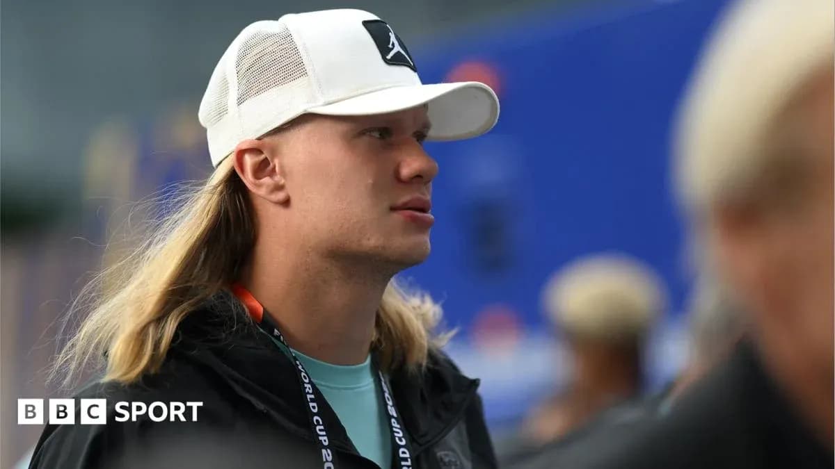 Individual wearing a white cap at an event