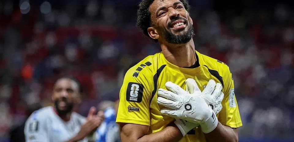 Goalkeeper celebrating after a match in uniform