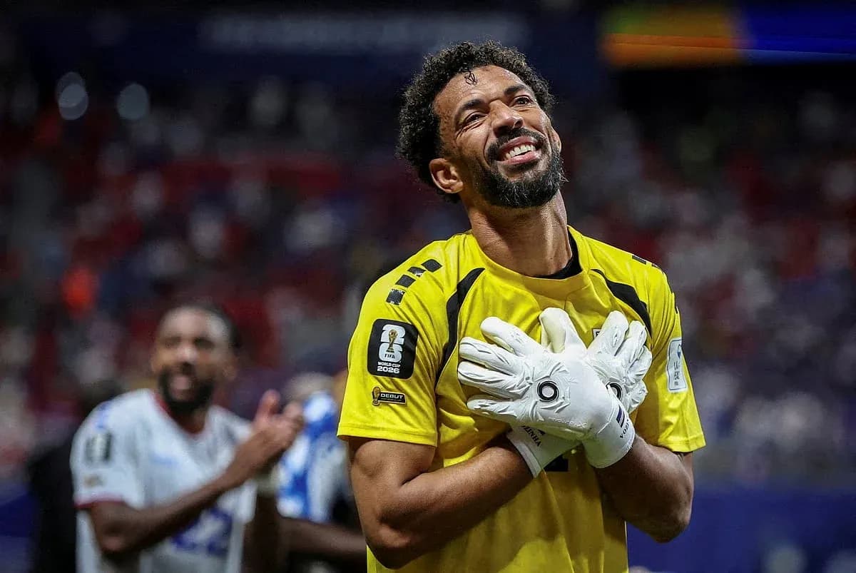 Goalkeeper celebrating after a match in uniform
