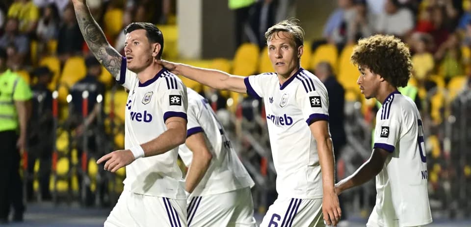 Anderlecht players celebrating during a match