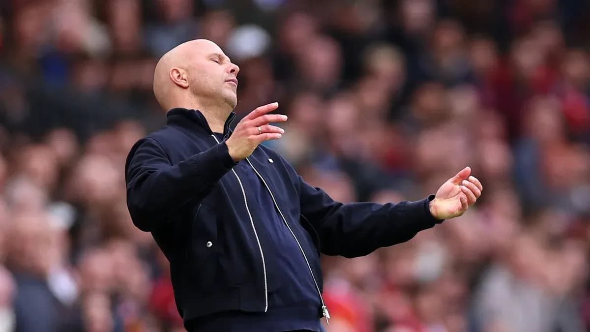 Coach gesturing during a match on the sidelines