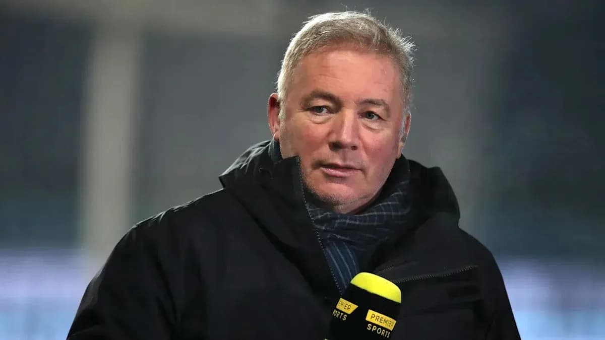 Sports commentator speaking into microphone on set