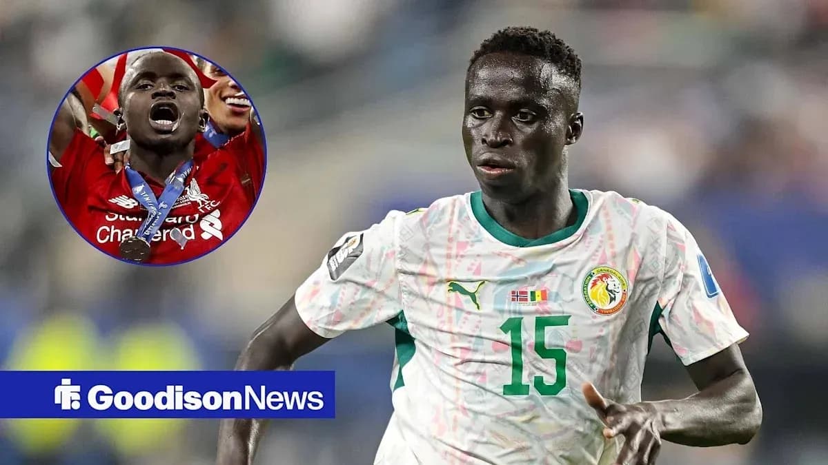 Player in Senegal jersey running during a match