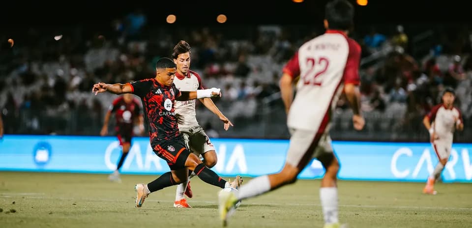 Player kicking the ball during Phoenix Rising match