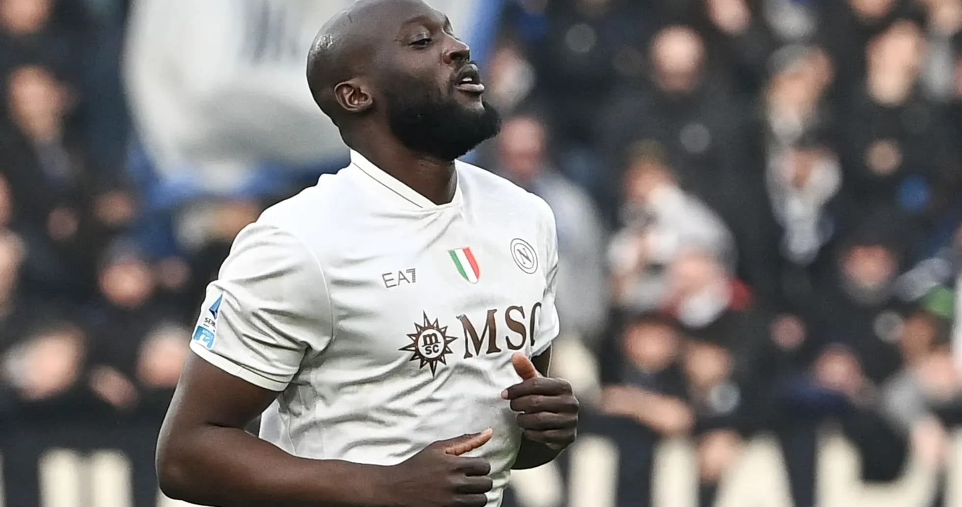 Player celebrating after scoring a goal in match