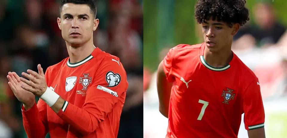 Two Portuguese players in red jerseys on field