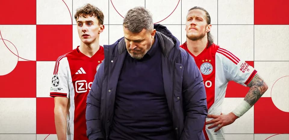 Ajax coach with players in team jerseys