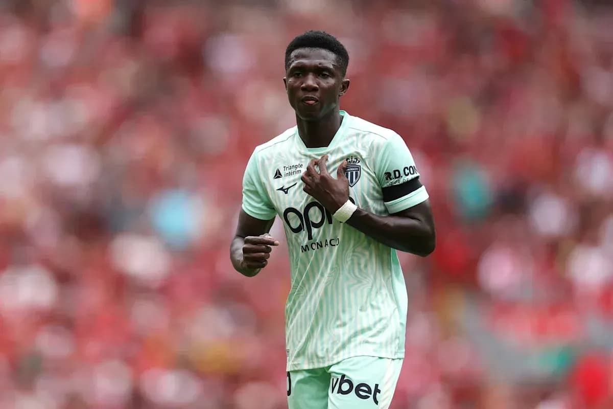 Player in mint green jersey during match