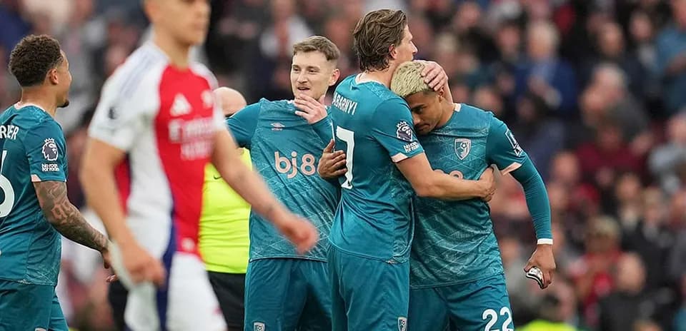 Bournemouth players celebrating a goal against Arsenal