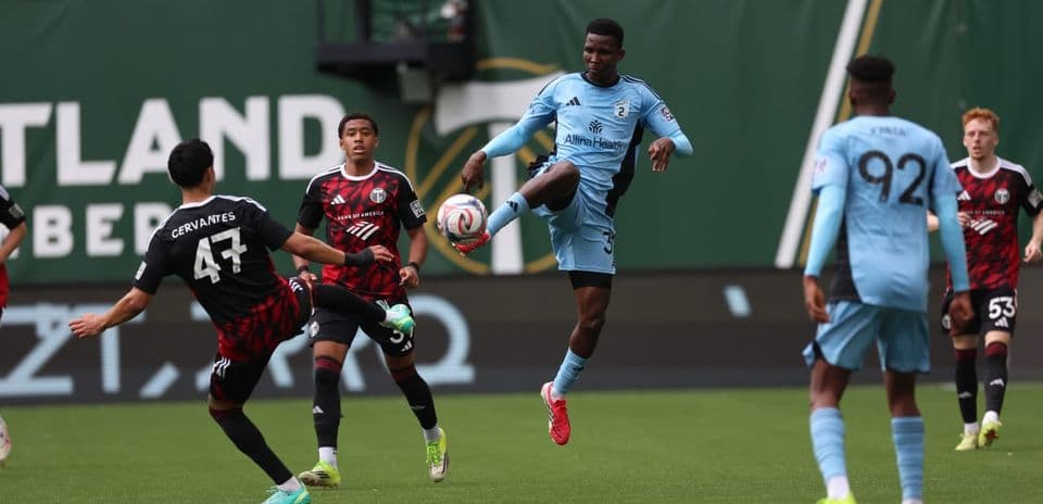 Player kicking ball during Portland Timbers II match