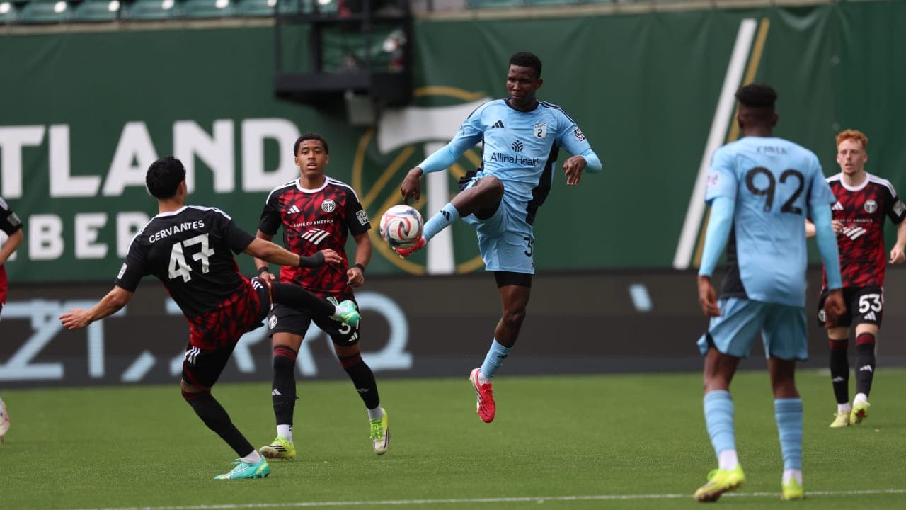 Player kicking ball during Portland Timbers II match