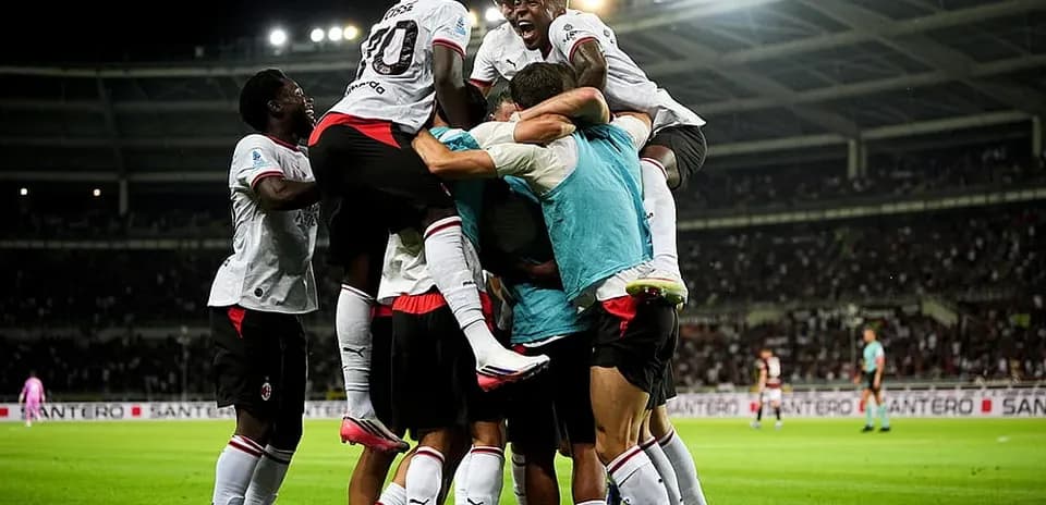 AC Milan players celebrating a goal during match