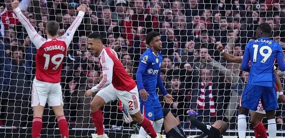 Arsenal players celebrating a goal against Chelsea